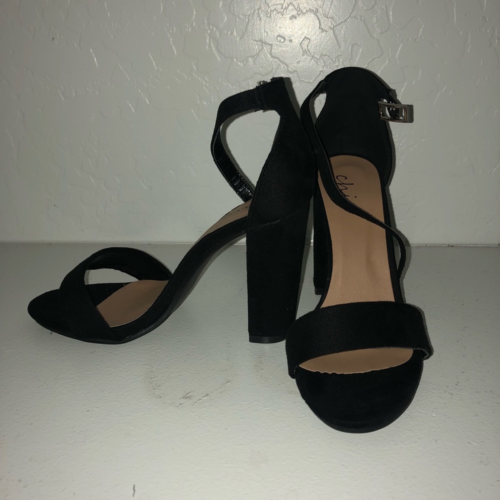 Thick heeled black strap heels
